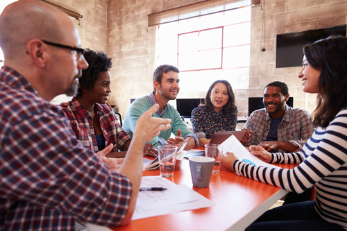 group coworkers discuss around table